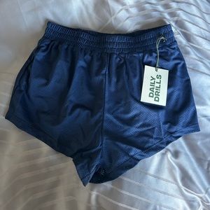 Navy daily drills shorts, super cute they just don’t fit me.